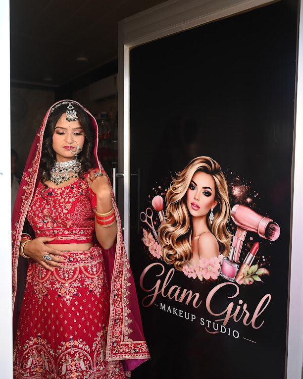 Bride in a red lehenga at the entrance of Glam Girl Makeup Studio, Varanasi